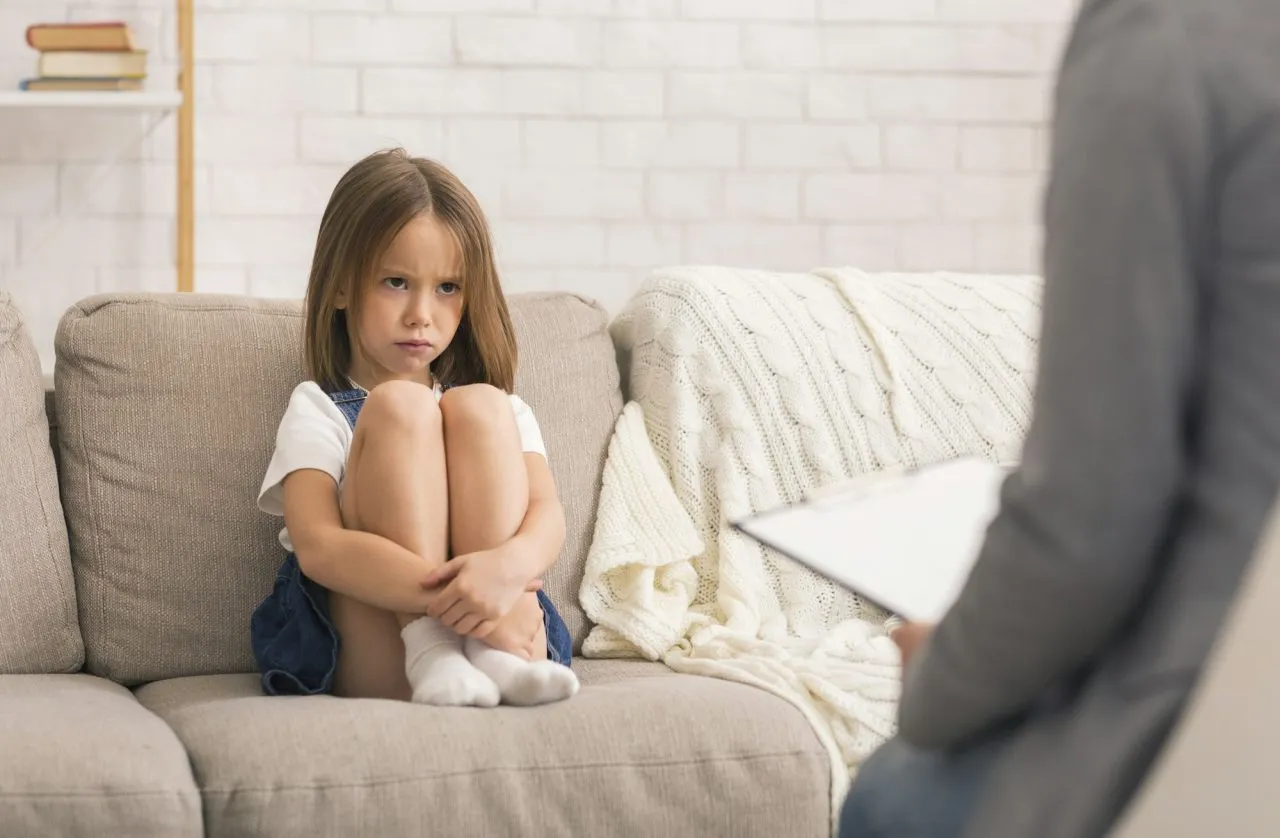 concerned-little-girl-sitting-